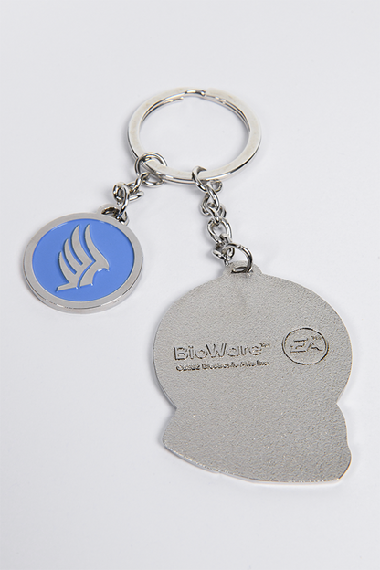  Image shows Mass Effect Morality Keychain with the Shepard charm facing back showing the Bioware and EA logos. While the 2-sided morality charm is showing the Paragon side. 