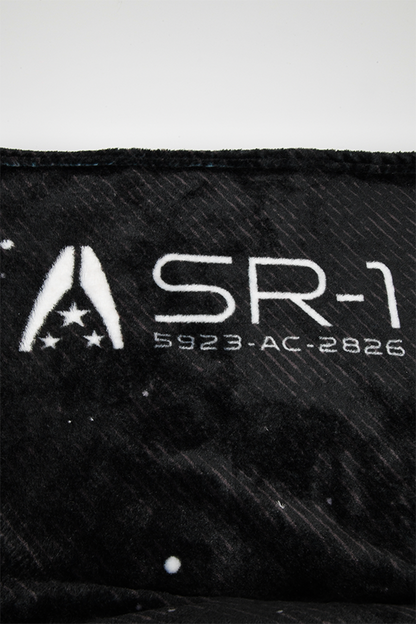 Image shows Mass Effect Team Throw Blanket zoomed in at the alliance logo and text that reads SR-1