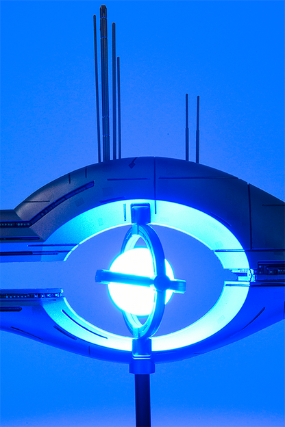 Image shows Mass Relay Replica's Blue Orb lit up in a low lit room. Consider these akin to physics-defying super highways that’ll take you and your fellow transit from one part of the galaxy to another. The best thing—you’ll probably beat light by a few thousand years
