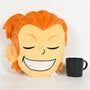 Image shows the Varric Plush Pillow beside a black mug for scale. 