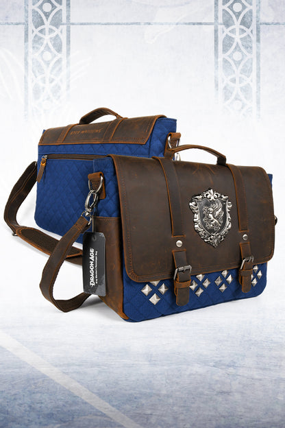 Image showing the Dragon Age Grey Warden Leather Bag from 2 three-quarter views: one facing left showing the back, one facing right showing the front.