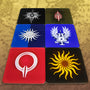 Image showing all 6 designs of the Dragon Age Coaster Set. All coasters are shown lying down with 3 coasters on each side.   Each coaster is made with an acrylic top over design on paper with transparent anti-skid feet. Each coaster is showing one of the six Dragon Age: Inquisition Heraldry Symbols.