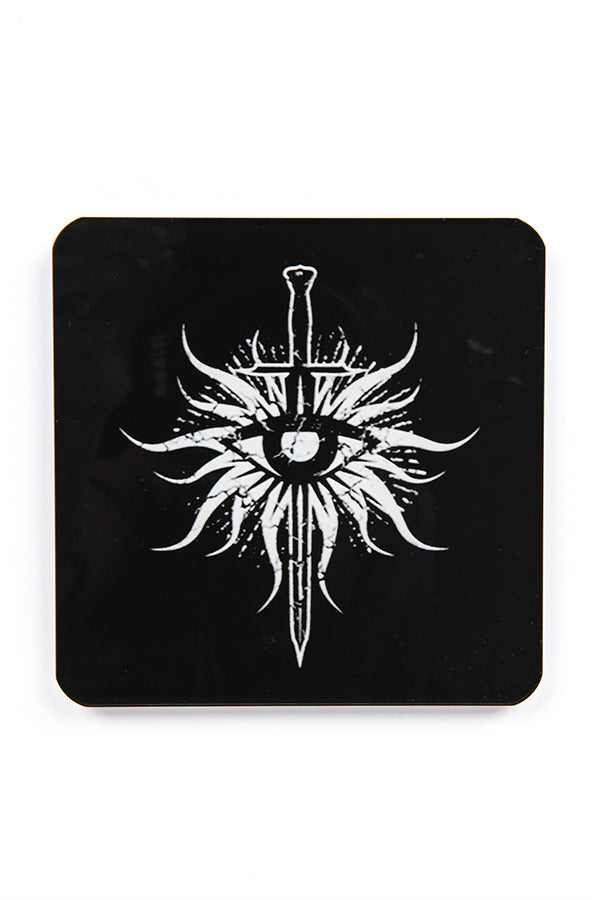 Image shows the coaster with the Inquisition heraldry symbol.  The symbol is white showing the blade of mercy pointing down under the all seeing eye over a black background. 