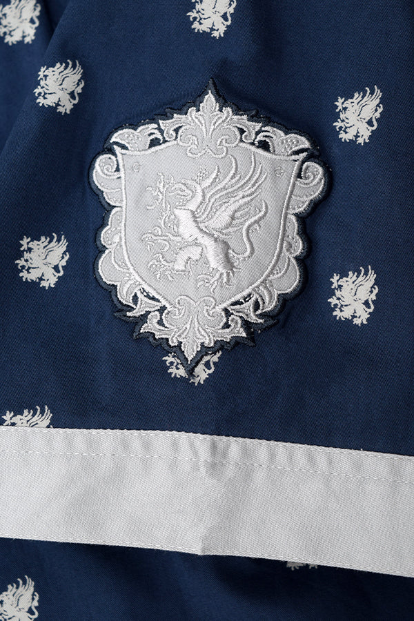 Image shows embroidered Grey Warden print upclose highlighting the Grey Wardens isignia which is a griffon.