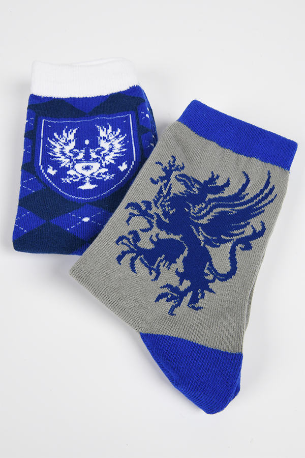 Image shows Dragon Age Grey Warden Sock Set laid flat on top of each other. Put on these socks before your start your journey through Thedas and defeat that blight in style. Made using a blend of cotton and poly with elastic, these socks give your feet some much-needed respite whether you’re walking in the valleys of Ferelden or driving around town.
