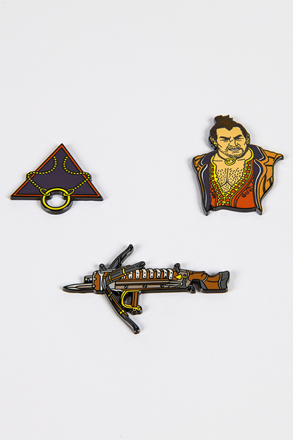 Image shows Dragon Age Varric Pin Set laid flat facing front. Product is a set of 3 and is made with Zinc Alloy with hard enamel + premium locking pin backs. 