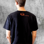Image shows Mass Effect True Renegade OPA Tee worn by male model facing back. You play by your rules and you break them too, and with this Mass Effect True Renengade OPA Tee, you can do it in style.