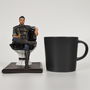 Image shows Mass Effect Kaidan Alenko Statue facing front beside a black mug (for scale).