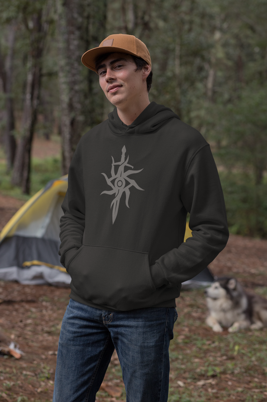 Image showing young man in the woods wearing Inquisition Hoodie.