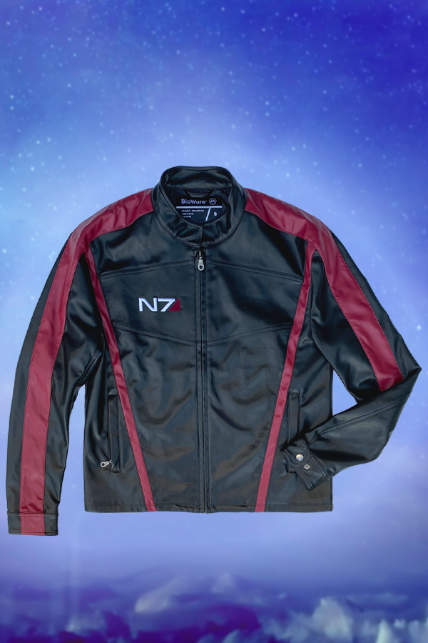 Image shows Mass Effect N7 Jacket Reimagined facing front with the left arm sleeve folded to the jacket's left side pocket. Fully lined with a front zip closure, this 100% polyester leather jacket is created in the image of the one from the game. It features classic red stripes and details, the N7 logo embroidered on the chest, and welted zip pockets.