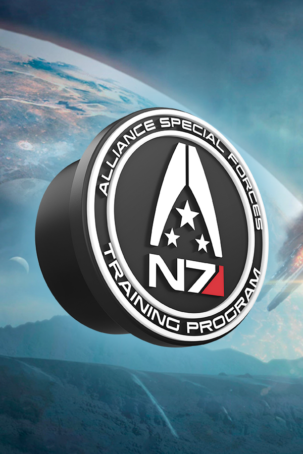 Image shows Mass Effect Puck facing at an angle. Made using Silicone, this Mass Effect Puck features a powerful magnetic back that attaches it directly to your CPU case or any other metallic surface. It comes with a 3D design of the N7 training program emblem.
