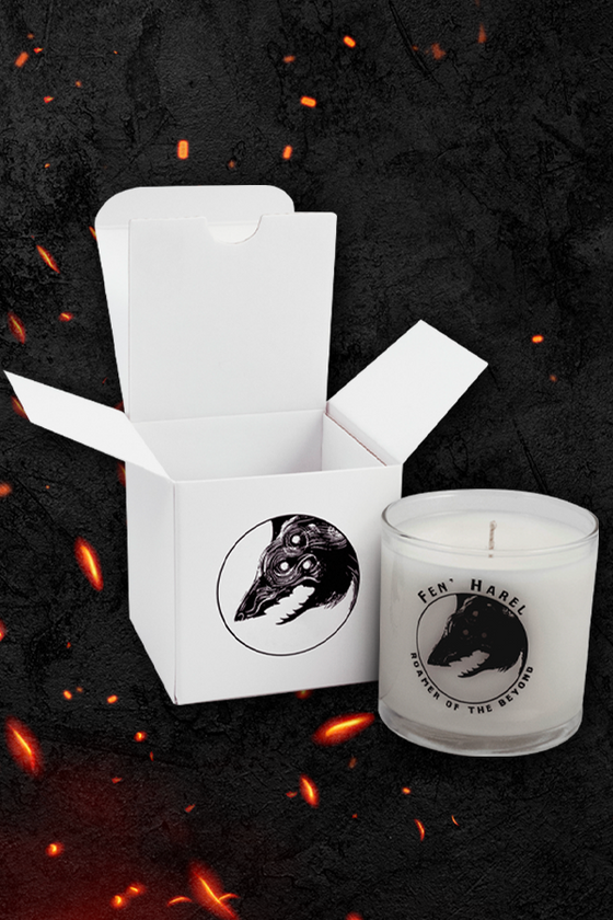 Image shows Dragon Age Fen Harel Scented Candle beside its box. With this scented candle, we have recreated the Dread Wolf’s spirit in its woody, musky wonder. Coconut soy wax is hand poured into a 6oz glass tumbler that is printed with Fen' Harel's image. Light it up in the evenings and go back to the time when the roamer of the beyond was among us.
