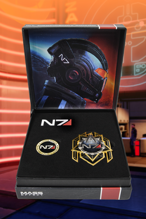 Image shows Mass Effect N7 Premium Box laid flat with th box open. The beautiful case with Mass Effect branding and N7 stripes features a graphic print of Commander Shepard’s helmet and a thick foam insert with a medal, an N7 card, and a Systems Alliance coin.