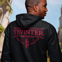 Image shows Dragon Age Tevinter Hoodie worn by male model facing back. Product features a back printed graphic and 3-panel hood.