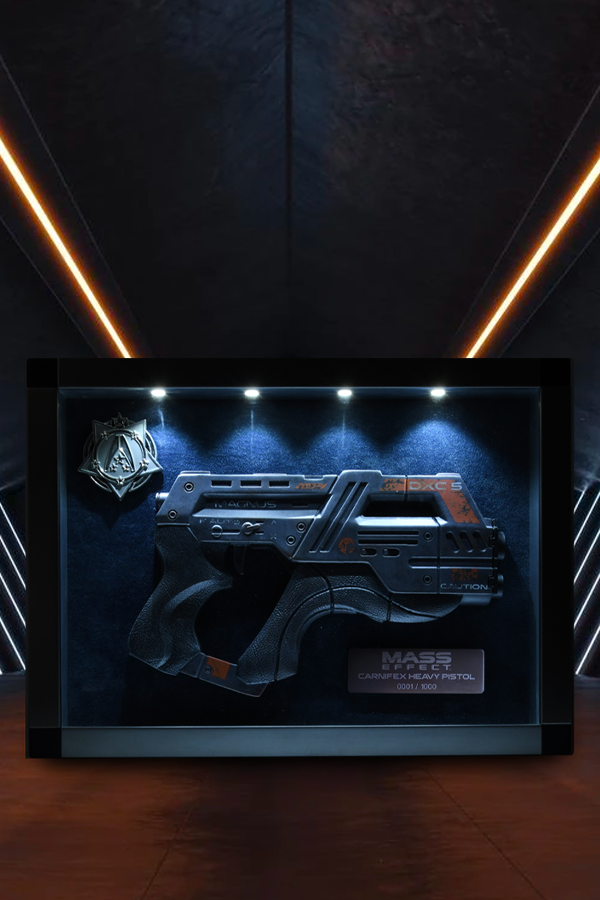 Image shows Mass Effect Carnifex Replica Shadowbox lit up from the inside while facing front. Product features a light up interior features using 4 LED lights that requires 3 AA batteries. 