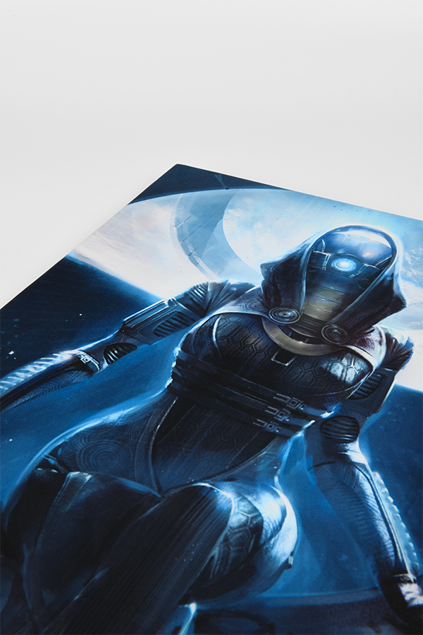 Image shows Mass Effect Tali Small Canvas Print laid flat zoomed at an angle. The canvas print is 11" x 15" in and 2" in width.
