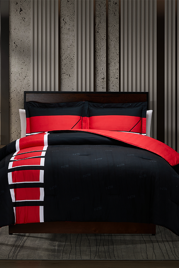 Image shows Mass Effect N7 Bed in a Bag arranged in a bed facing front. The N7 Bed comes rolled in a bag, including two shams. Available in double, queen, and king sizes. This travel-friendly bed is designed to offer you the comfort of a good night's sleep.
