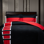 Image shows Mass Effect N7 Bed in a Bag arranged in a bed facing front. The N7 Bed comes rolled in a bag, including two shams. Available in double, queen, and king sizes. This travel-friendly bed is designed to offer you the comfort of a good night's sleep.