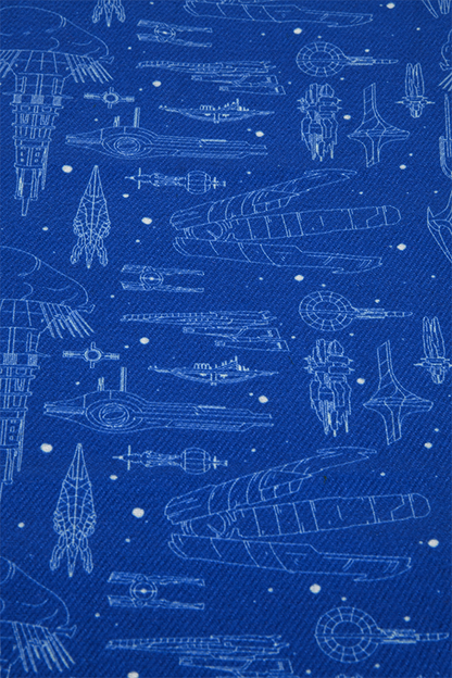 Image shows Mass Effect Ships and Stations Blueprint Scarf zoomed in at its details. Made with 100% polyester, this brushed woven scarf comes with an allover print. It is soft, light and warm, making it the perfect addition to your winter outfits.