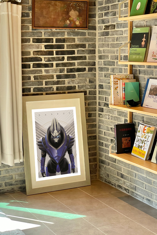 Image shows Mass Effect Garrus Fine Art Print leaning on a wall facing at an angle. The artwork is a full bleed print depicting Garrus dressed up as the Archangel.