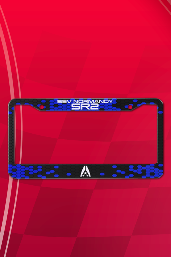 Image shows Mass Effect Normandy Auto Accessory Kit license plate facing front. The license plate is made with alufer material with a UV print.