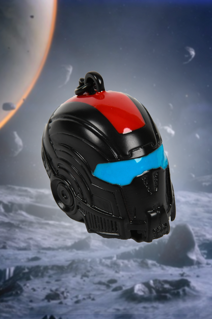 Image shows Mass Effect N7 Helmet Keychain facing at a right angle. Product is sculpted with zinc alloy with matte black finish and enamel accents.