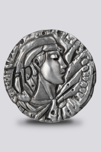 Image shows Dragon Age Cullen's Lucky Coin upright facing front. Product is made with zinc alloy with an antique silver finish.  