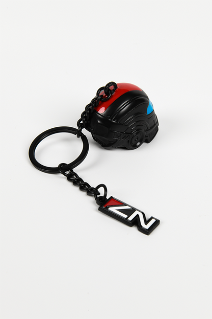 Image shows Mass Effect N7 Helmet Keychain facing back at a right angle with the N7 logo charm laid flat at the back. 