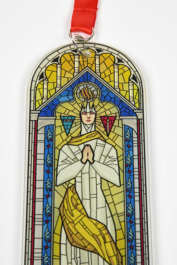 Image shows Dragon Age Andraste Stain Glass Holiday Ornament laid flat facing front. Product is made with glass.