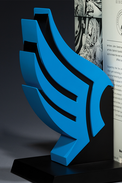 Image shows Paragon bookend standing upright facing at an angle. The Paragon bookend is bright blue in color. Paragon points are gained for compassionate and heroic actions. The Paragon measurement is colored blue. Points are often gained when asking about feelings and motivations of characters.