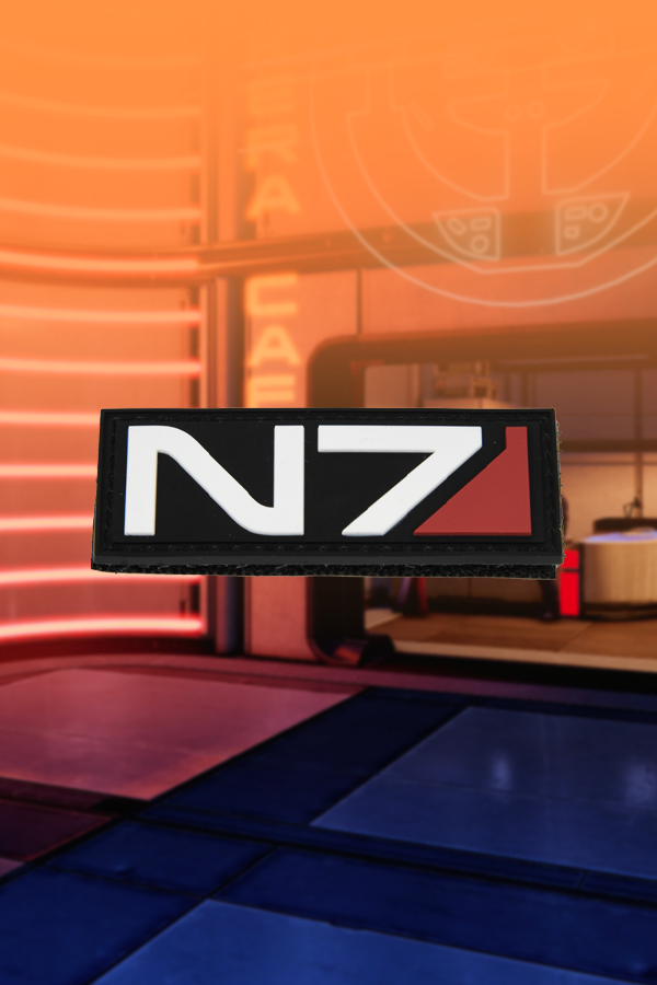 Image shows N7 Premium Box's N7 card laid flat facing front. The N7 emblem is visible on all customizable armor chest pieces wearable by Commander Shepard except for the Kestrel Torso Sheath and the Rosenkov Materials chest piece.