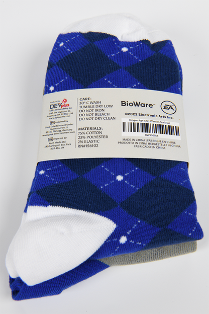 Image shows Dragon Age Grey Warden blue argyle socks folded and laid flat facing back. Product size is Unisex Adult (one size fits most)