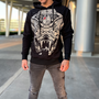 Image shows Mass Effect N7 Armour Hoodie worn by male model facing front. Product features a pullover style with side seam pockets.