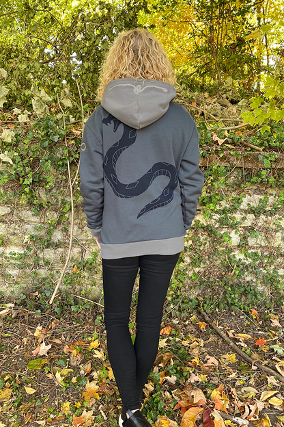 Image shows Dragon Age Dorian Pavus Hoodie worn by female model facing back, Product is made with 80% cotton and 20% polyester.