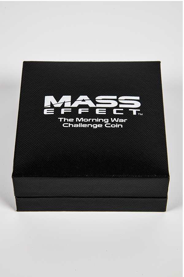 Image shows Mass Effect Morning War Challenge Coin's Box facing front. The box is 2.95 x 2.95 x 0.98 inches.