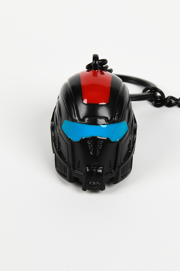 Image shows Mass Effect N7 Helmet Keychain facing front. Helmet features a blue and red enamel accents.