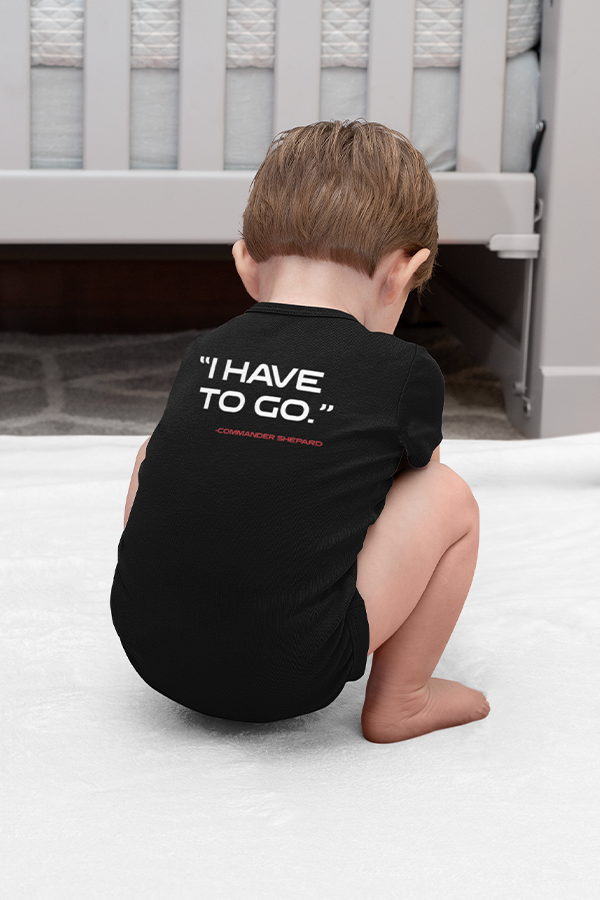 Image shows N7 I Have To Go Baby Onesie worn by baby model facing back. Product weighs 5.0 pz. with flatlock stitched seams.