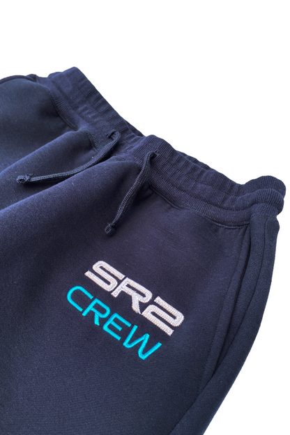  Image shows Mass Effect SR-2 Crew Member Lounge Set's Pants facing front with the SR2 Crew print zoomed in. Product features a left hip embroidery.