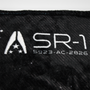 Image shows Mass Effect Team Throw Blanket zoomed in at the alliance logo and text that reads SR-1