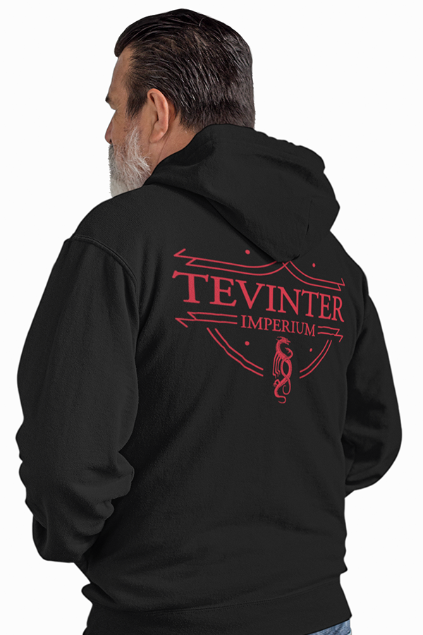 Image shows Dragon Age Tevinter Hoodie worn by male model facing back. Product is tightly knit with self-fabric 1/2 moon patch on neck.