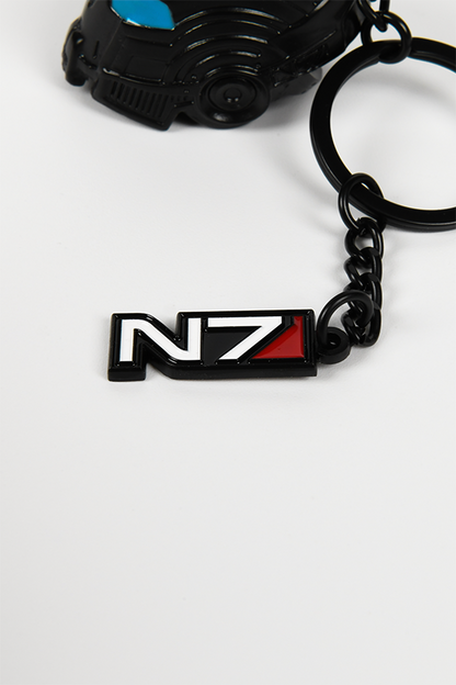 Image shows the N7 logo charm laid flat facing front. The N7 logo charm features white and red enamel fillings.