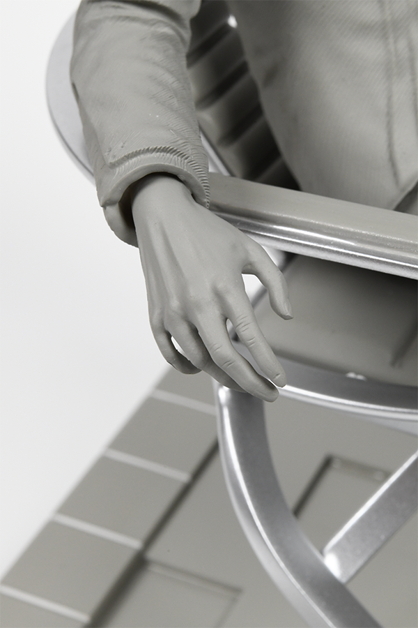 Image shows Illusive Man Prototype Statue's right hand zoomed in.  Product highlights the iconic scene of the Illusive Man on his chair, staring up at a hologram of the Collector's base.