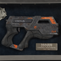 Image shows Mass Effect Carnifex Replica Shadowbox facing front zoomed in at the M-6 Carnifex pistol. The pistol is hand-painted and 8