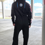 Image shows Mass Effect N7 Adult Onesie Reimagined worn by a model facing back. N7 is a vocational code in the Systems Alliance military. The 