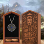 Image shows Dragon Age Alistair Romance Bundle facing front. The bundle includes a wooden box, a love letter and an amulet necklace.