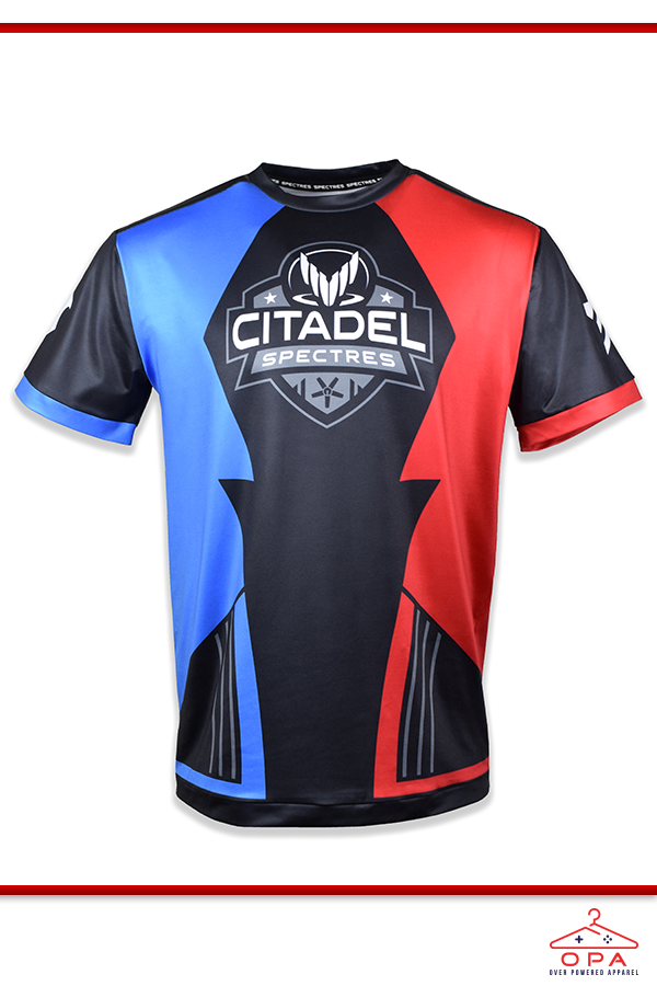 Image shows Mass Effect eSport OPA Jersey facing front. T-shirt features brilliant red, black & blue panels with a geometric pattern that reminds us of the Normandy. The Citadel Spectres emblem is printed at the center.