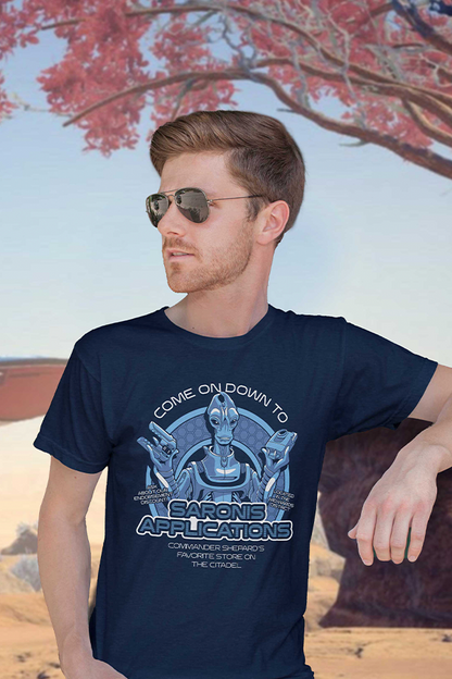 Image shows Mass Effect Saronis Applications Tee worn by male model facing at an angle. Product features a double-needle sleeve and bottom hem.