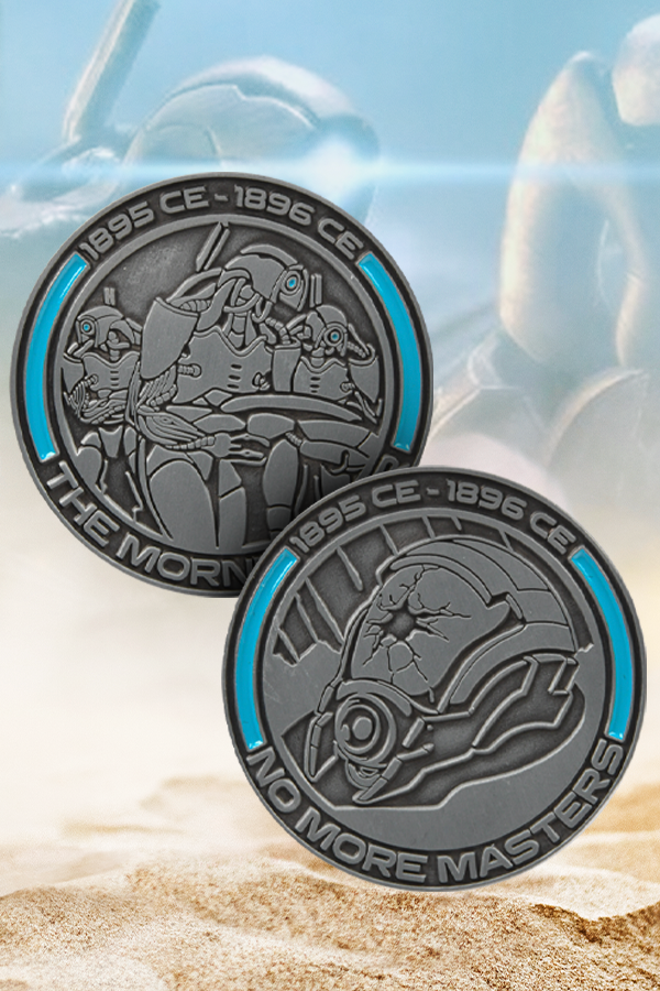 Image shows 2 Mass Effect Morning War Challenge Coins showing the front and back. An important event in the history of the Galaxy and the Perseus Veil, this Mass Effect Morning War Challenge Coin commemorates the fallen Quarians and the might of their servants. The coin features a Geth armed forces on one side and a destroyed Quarian helmet on the other, with timeline inscriptions and the words “The Morning War” and “No More Masters”. 