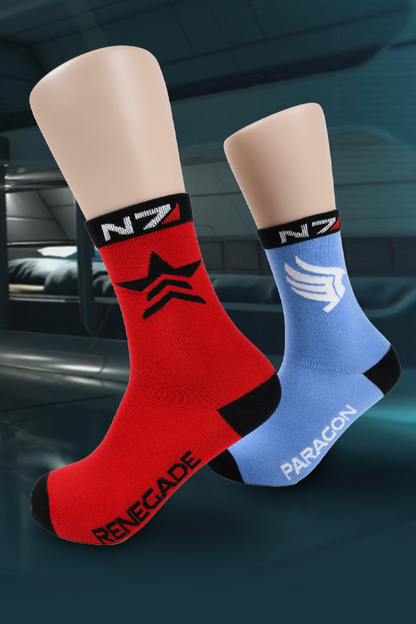 Image shows Mass Effect Paragon Renegade Sock Set worn on mannequin feet. Made with cotton and polyester blended material, these socks come in red and blue colors with the signature paragon and renegade icons. At the cuffs, you’ll find the N7 logo printed in bold.